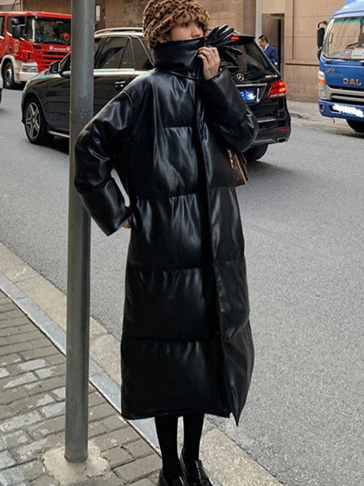 Aimee - Lange Leder-Pufferjacke mit Gürtel